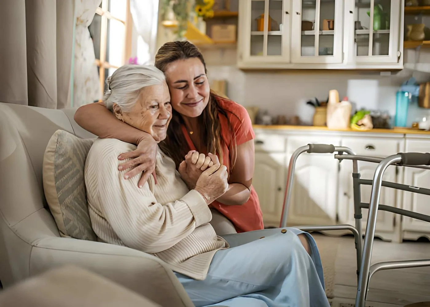 An older adult and family member sharing a quiet moment at home
